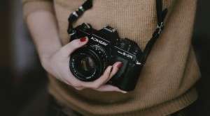 woman holding camera